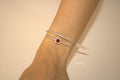 BRACCIALE IN ACCIAIO DOPPIO FILO DI LUCE CON PIETRA