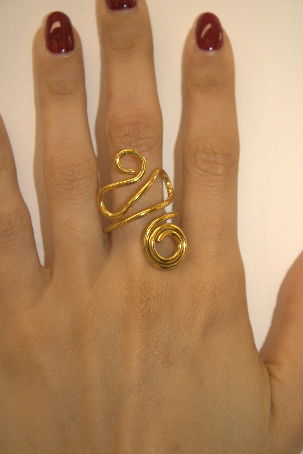 ANELLO IN ACCIAIO REGOLABILE SPIRALE DORATA