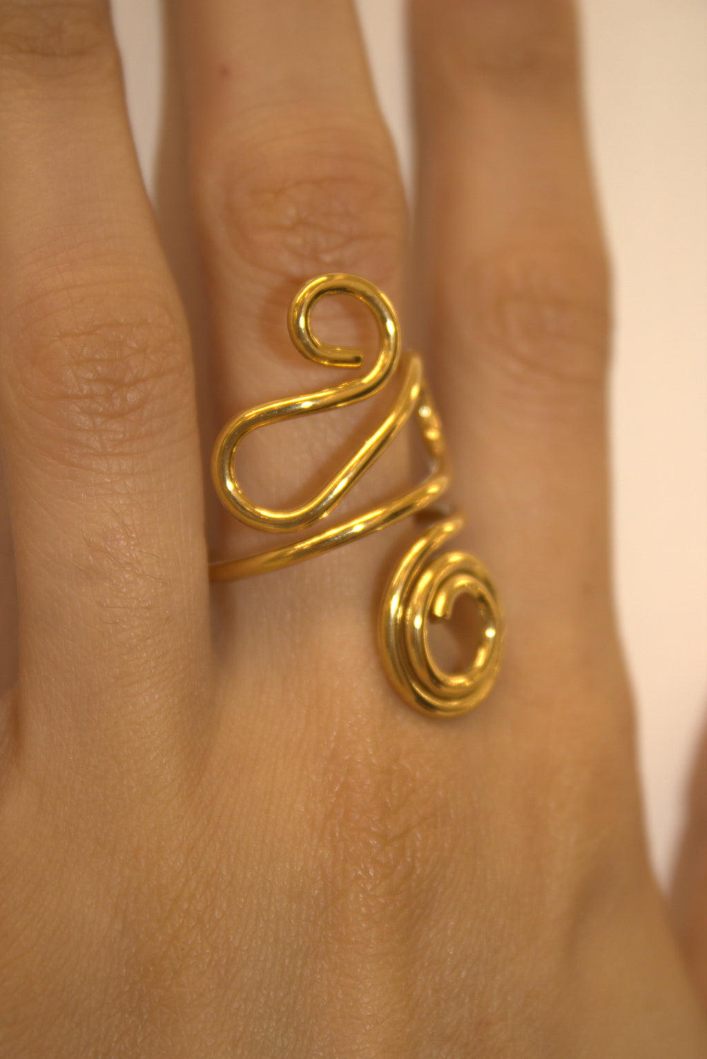 ANELLO IN ACCIAIO REGOLABILE SPIRALE DORATA