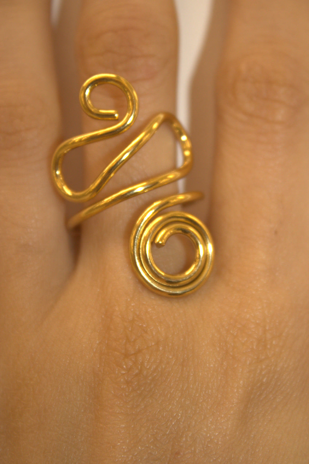 ANELLO IN ACCIAIO REGOLABILE SPIRALE DORATA
