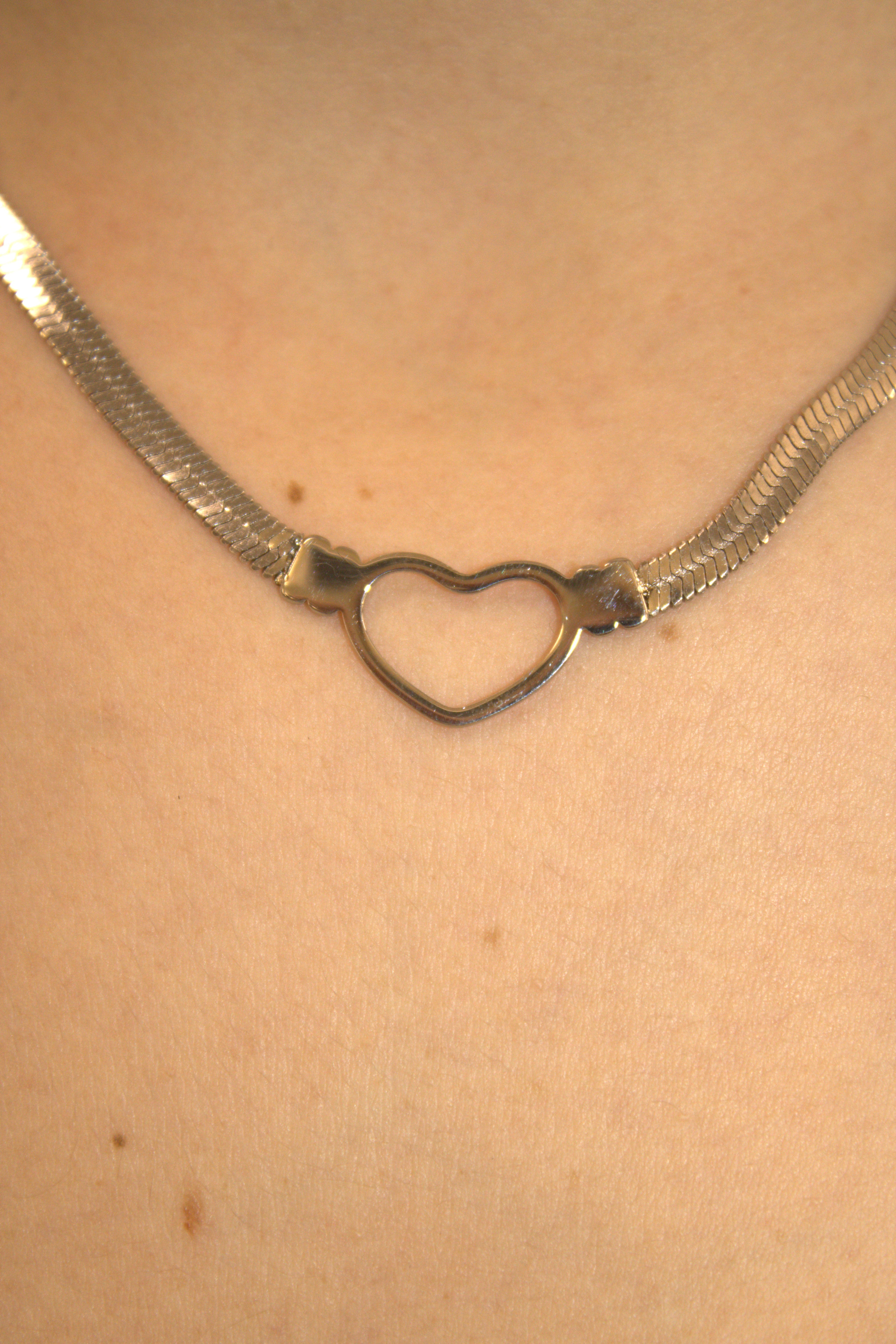 COLLANA IN ACCIAIO SNAKE A SPINA DI PESCE CON CUORE OPENWORK