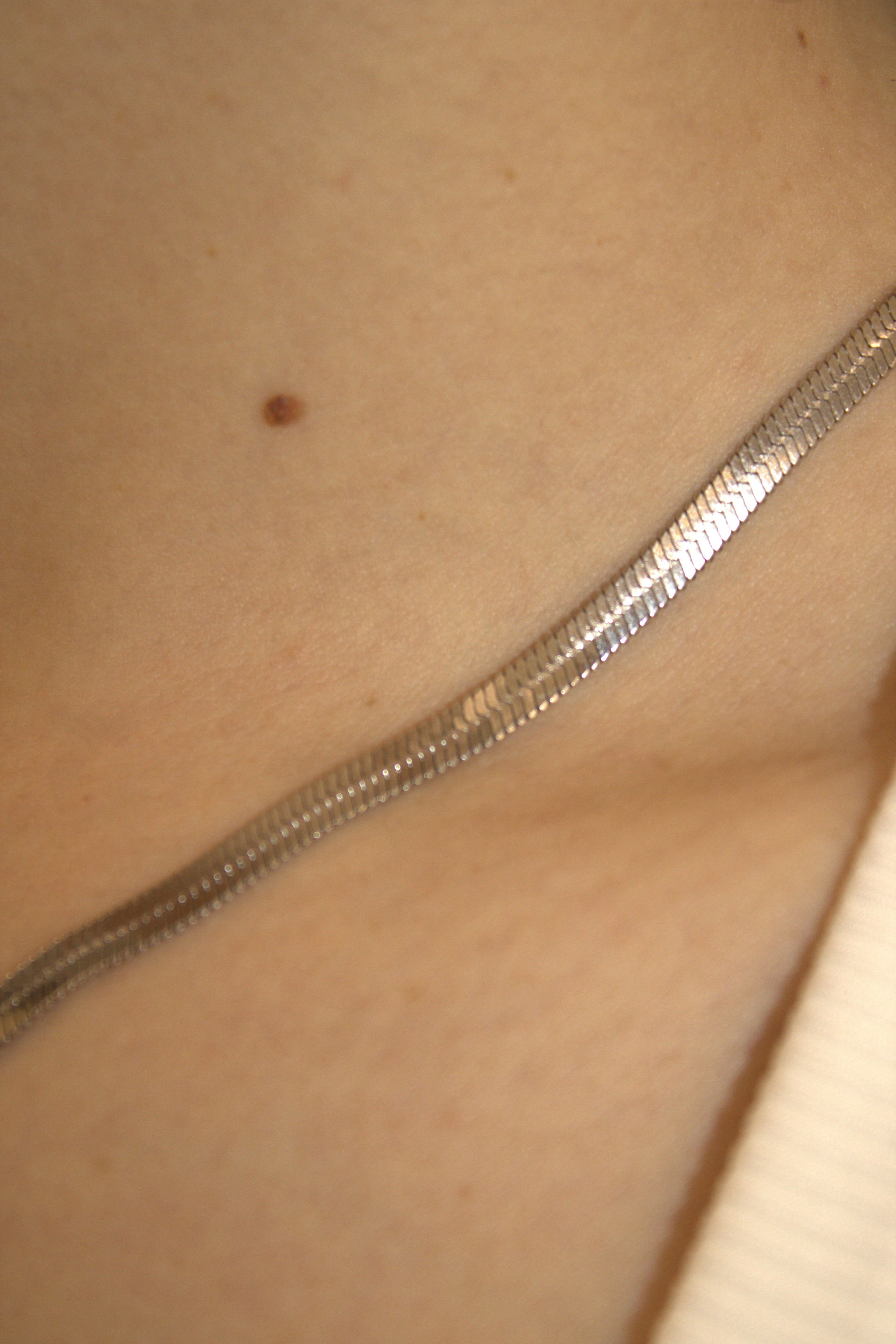COLLANA IN ACCIAIO SNAKE A SPINA DI PESCE CON CUORE OPENWORK