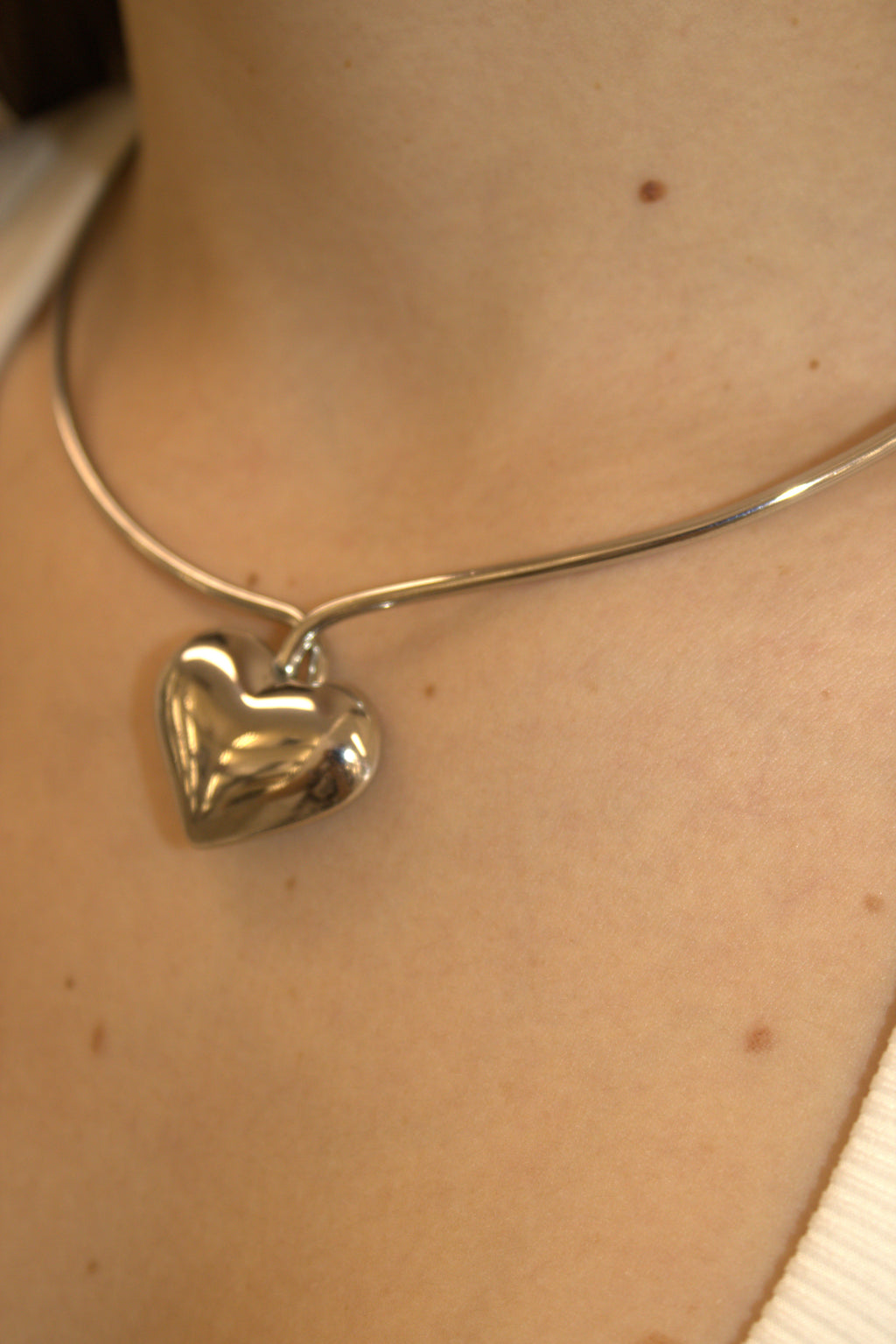 COLLANA IN ACCIAIO RIGIDA CON CUORE BOMBATO PUFFY