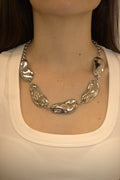 COLLANA IN ACCIAIO CON PLACCHE ORGANICHE FLUIDE