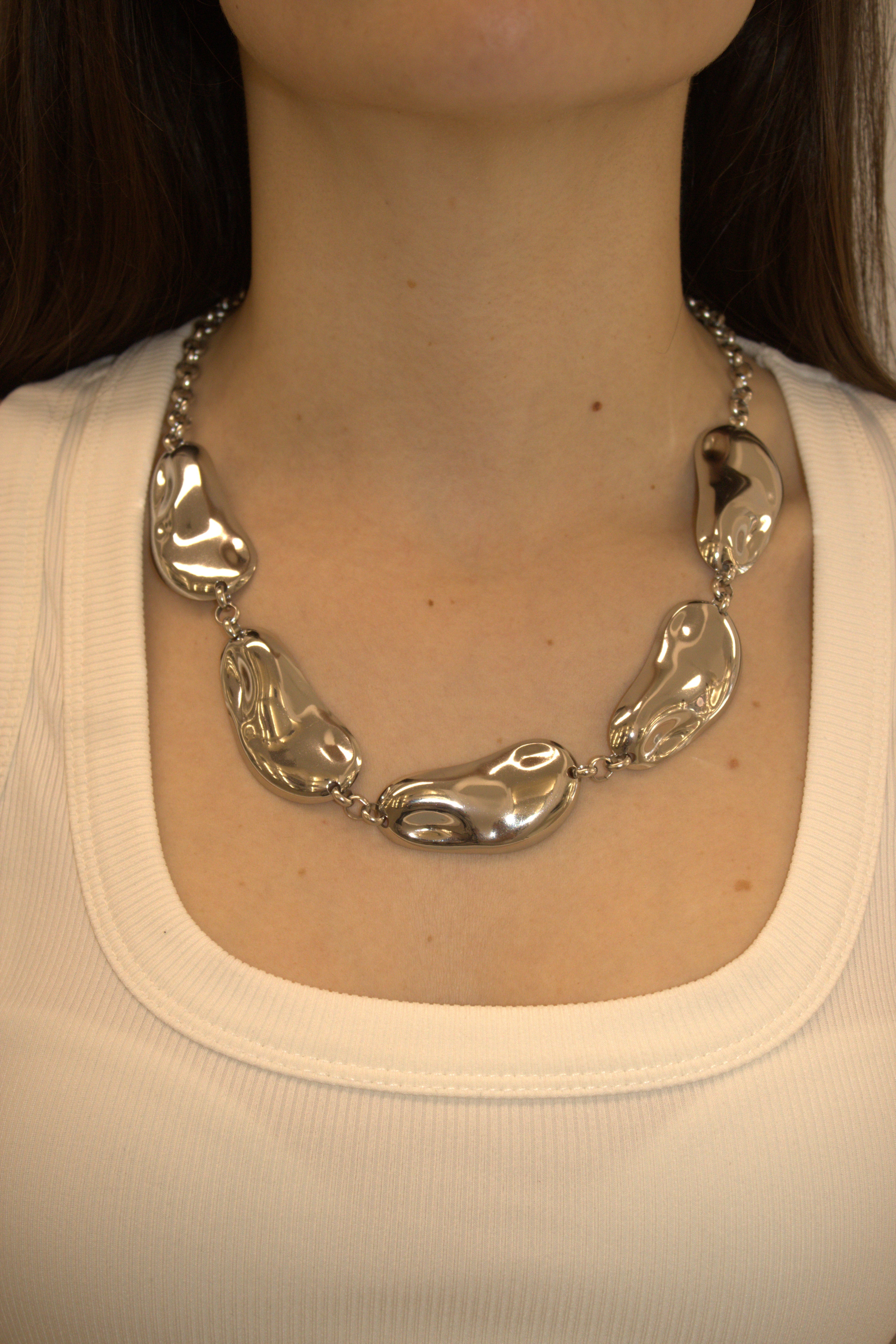 COLLANA IN ACCIAIO CON PLACCHE ORGANICHE FLUIDE