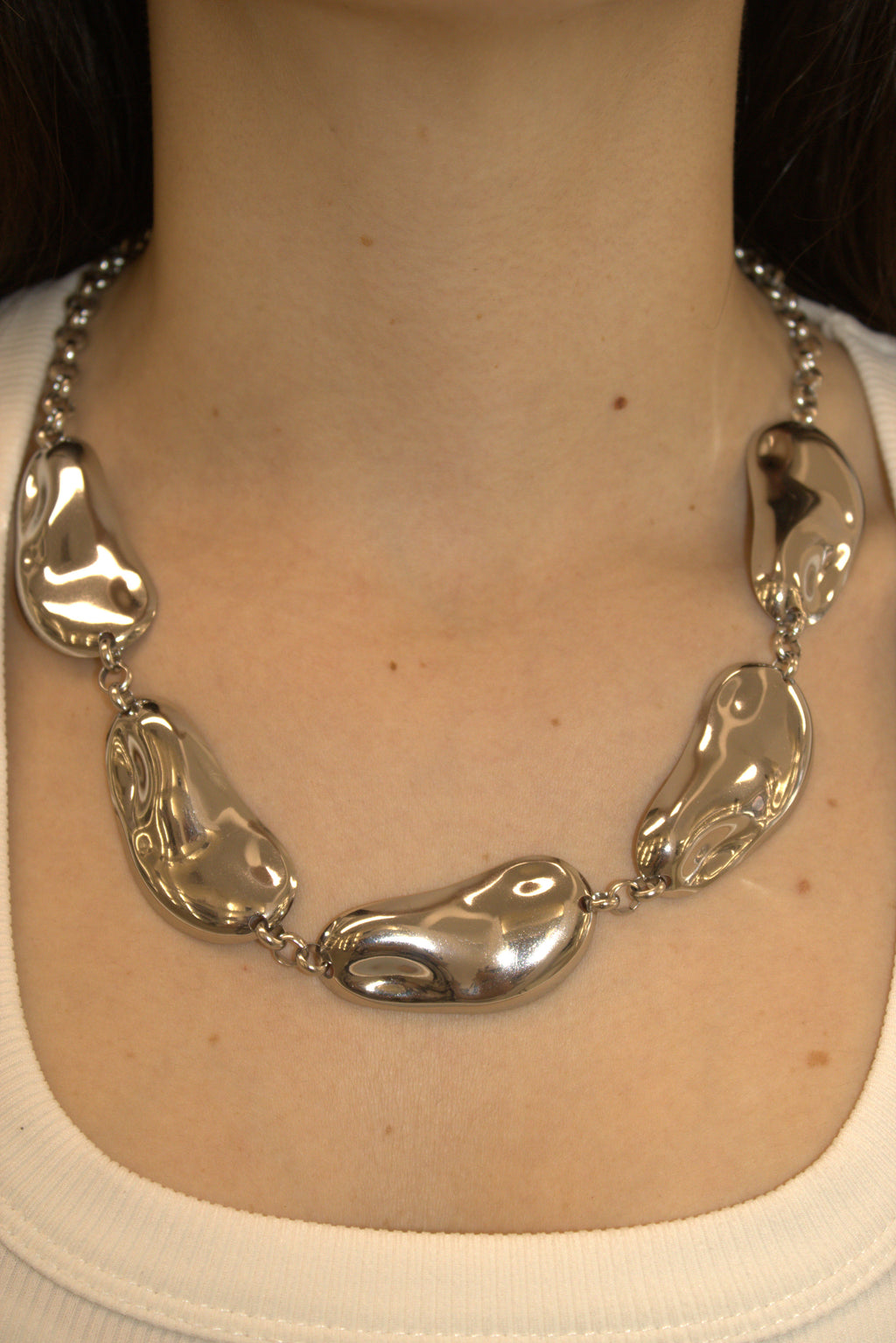 COLLANA IN ACCIAIO CON PLACCHE ORGANICHE FLUIDE