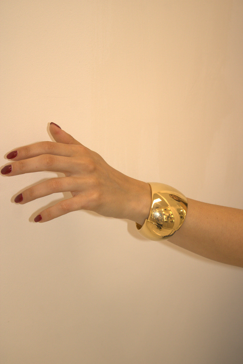 BRACCIALE IN ACCIAIO RIGIDO A FASCIA BOLD DORATO