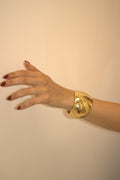 BRACCIALE IN ACCIAIO RIGIDO A FASCIA BOLD DORATO