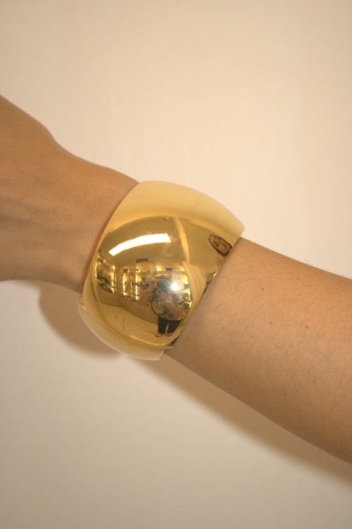 BRACCIALE IN ACCIAIO RIGIDO A FASCIA BOLD DORATO