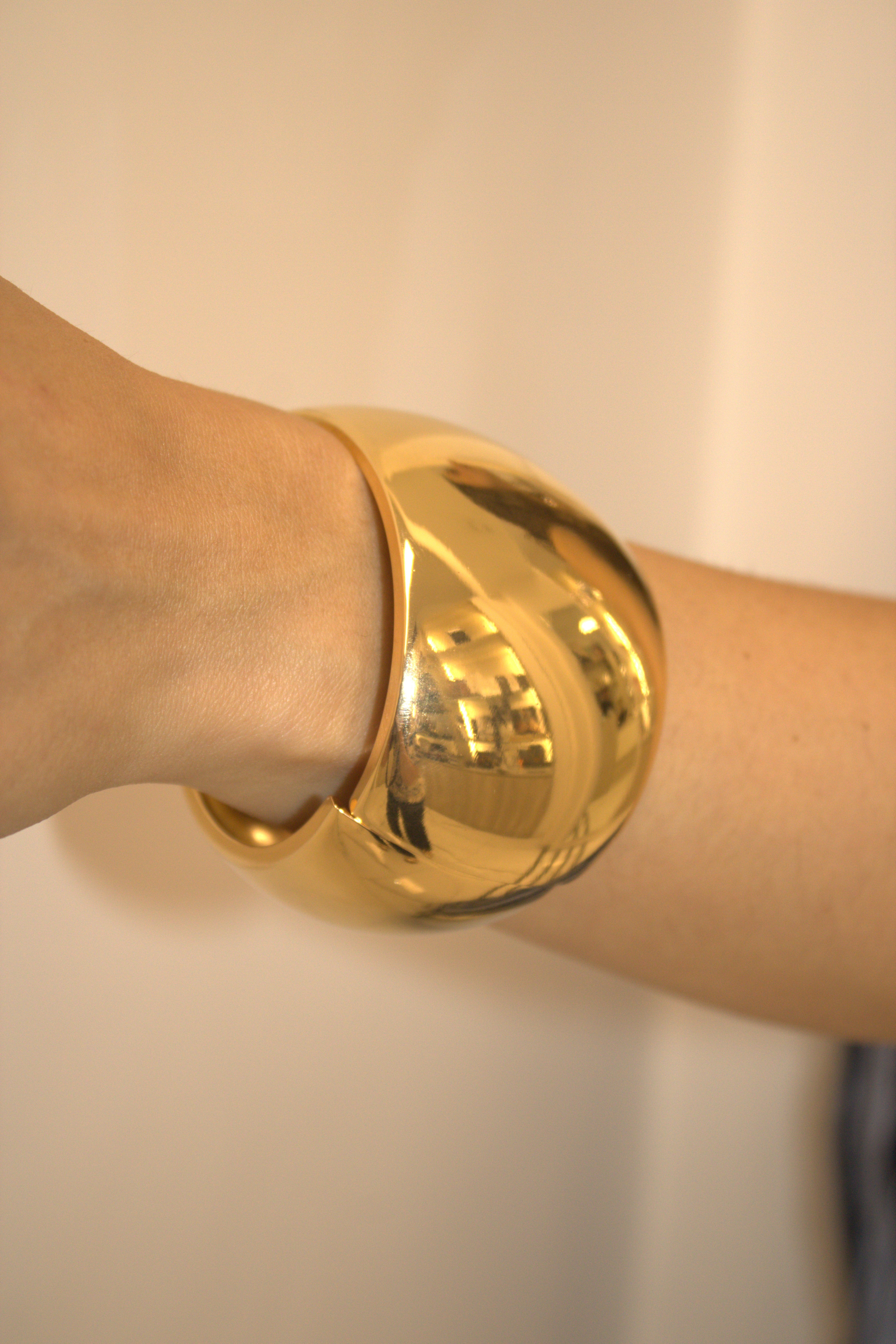BRACCIALE IN ACCIAIO RIGIDO A FASCIA BOLD DORATO